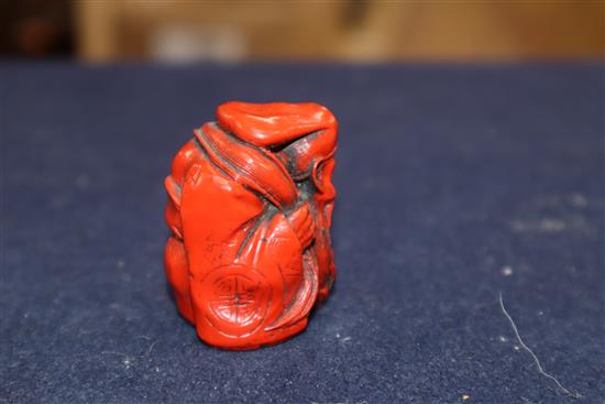 A Chinese carved jade group of two kylin, red lacquered and carved figure of a sage tallest 7cm
